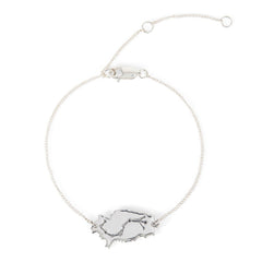 A sterling silver bracelet featuring a Scorpio constellation design on one side and the word 'Ibiza' on the other, with a lobster clasp closure.