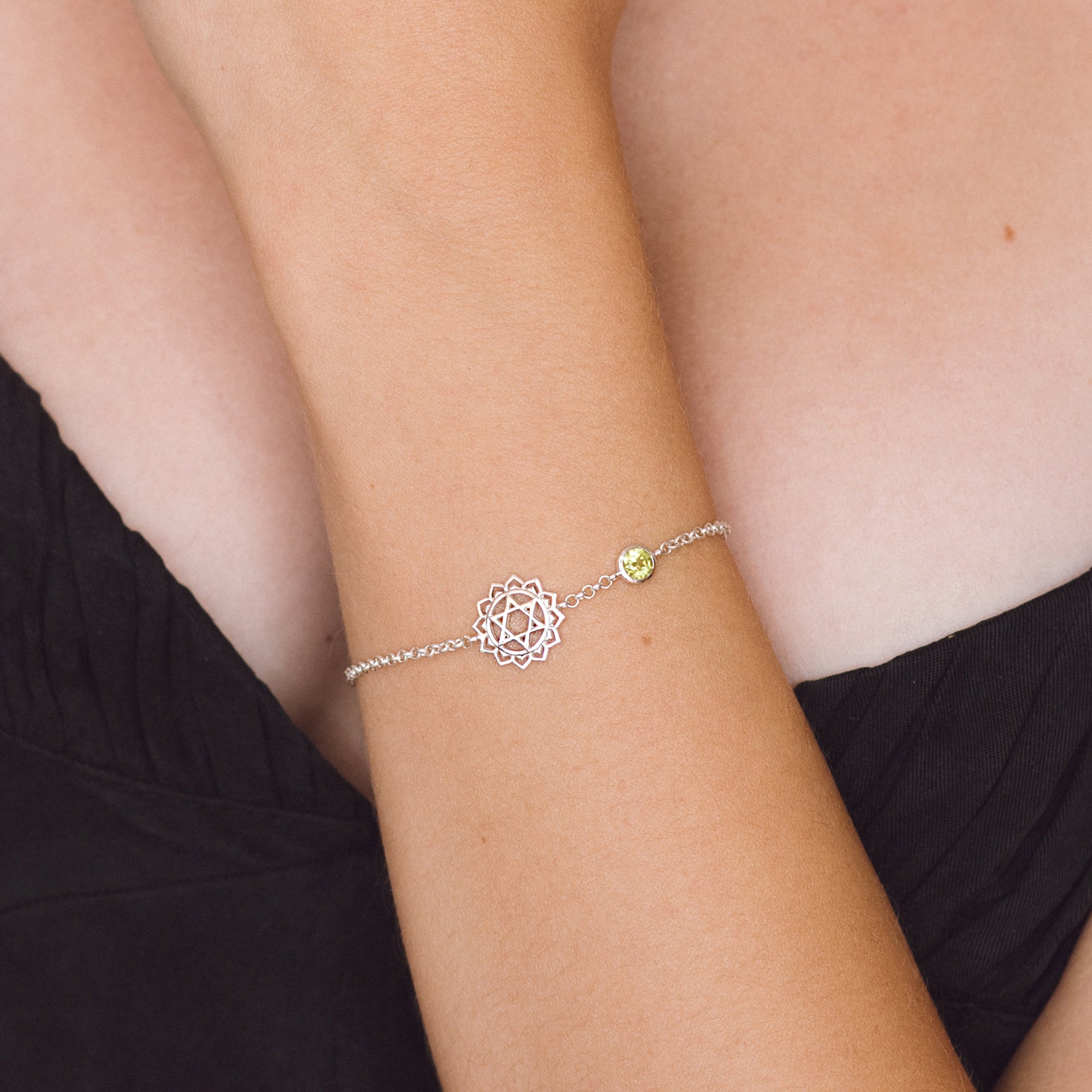 Sterling silver heart chakra bracelet with peridot green gemstone 