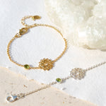 gold and silver heart chakra bracelet with green peridot gemstone