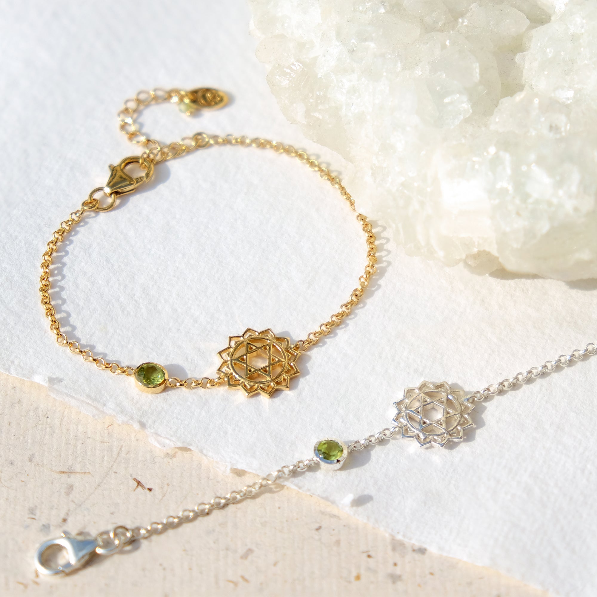 gold and silver heart chakra bracelet with green peridot gemstone