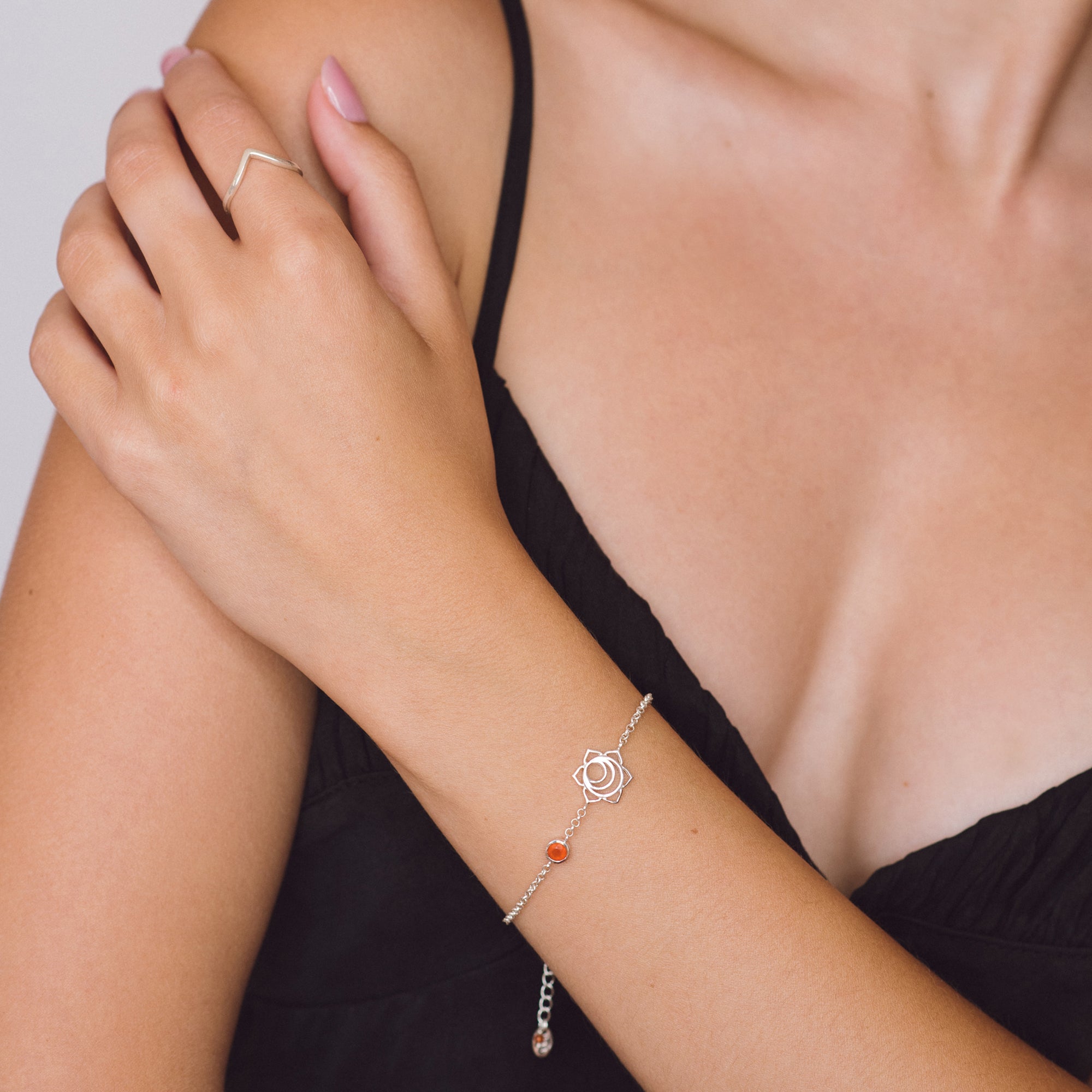 sterling silver sacral chakra bracelet with carnelian gemstone
