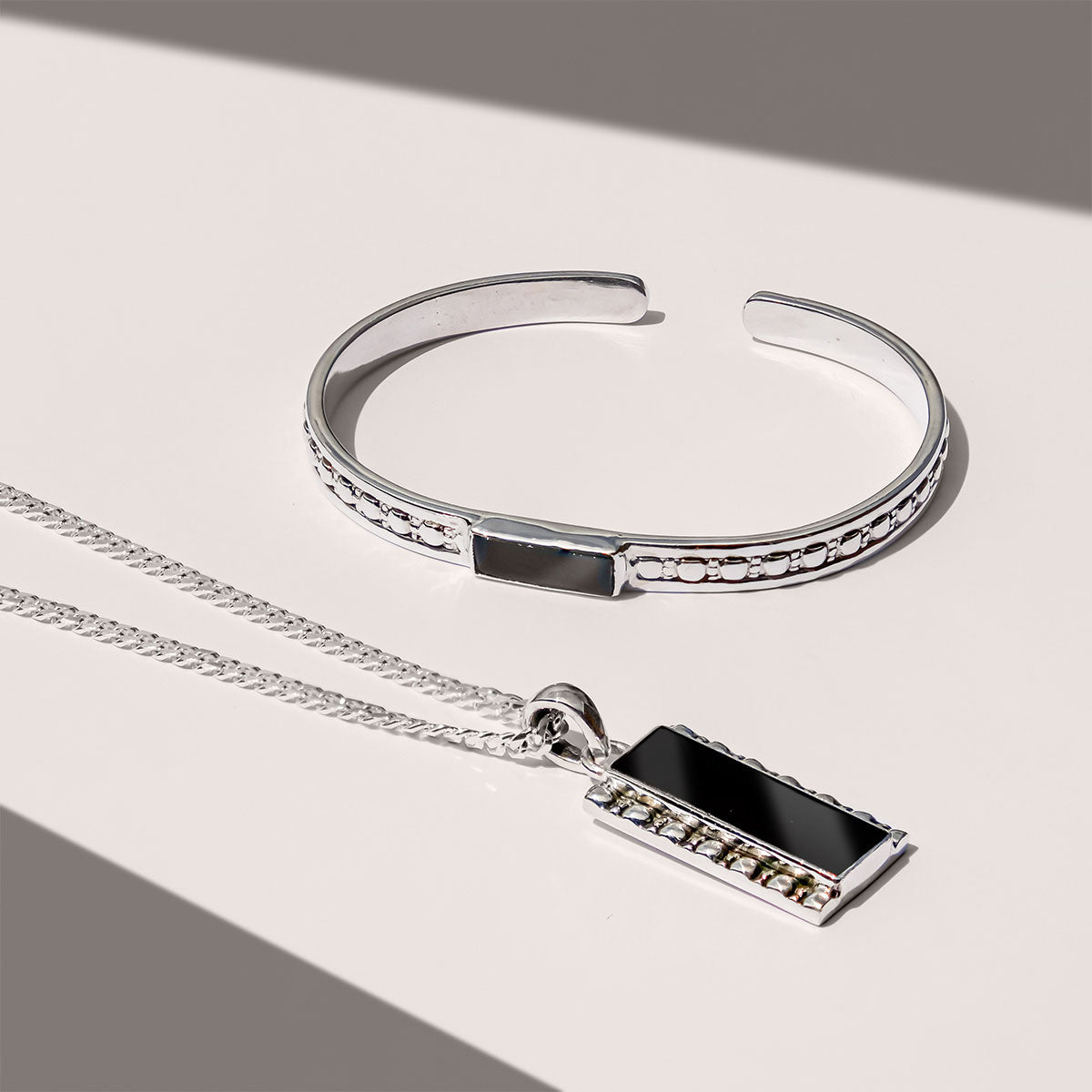 sterling silver mens bangle with black onyx and matching pendant necklace 