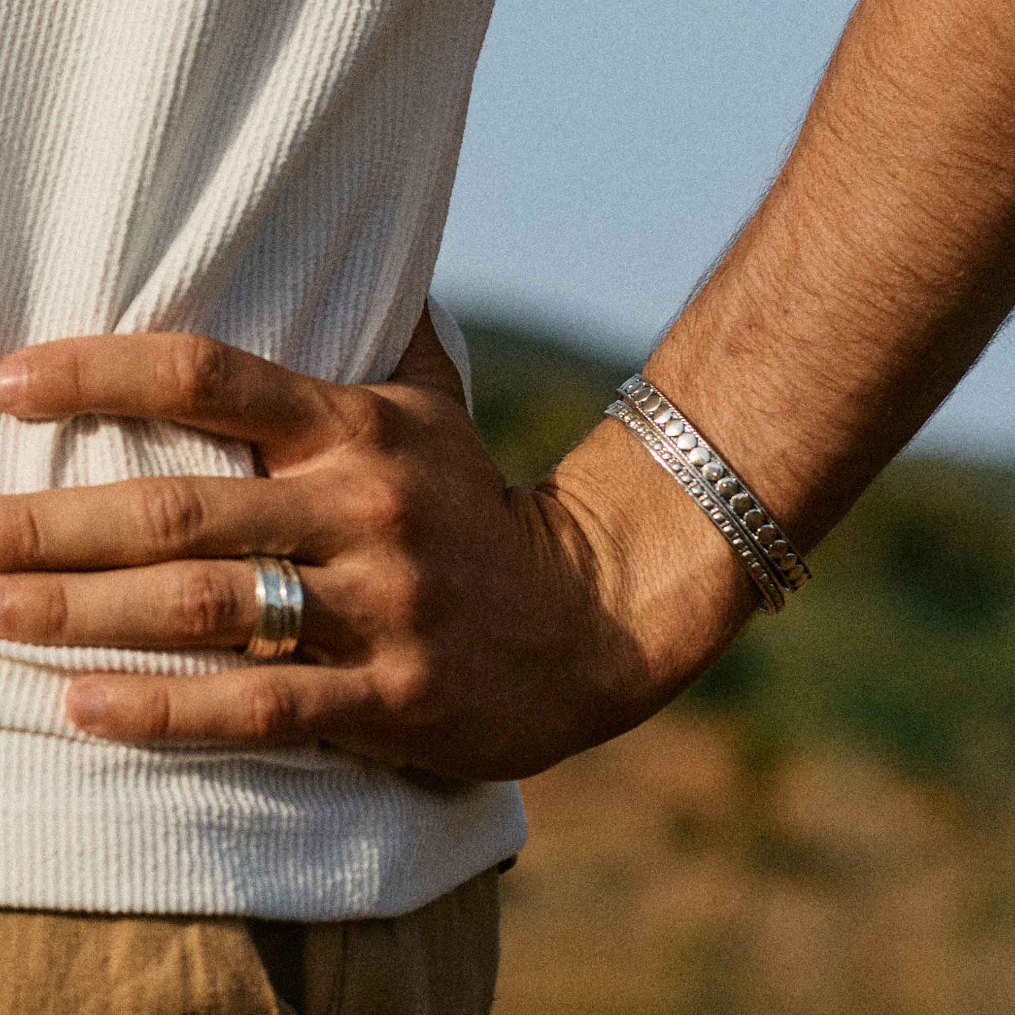 Mens sterling silver bangle with circle details