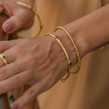 Gold stacking bangles, Gold and green gemstones stacking bangles, Gold bangles, Stacking bangles