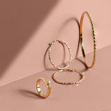 Gold hammered hoop earrings, gold spinning ring and gold handmade stacking bangle