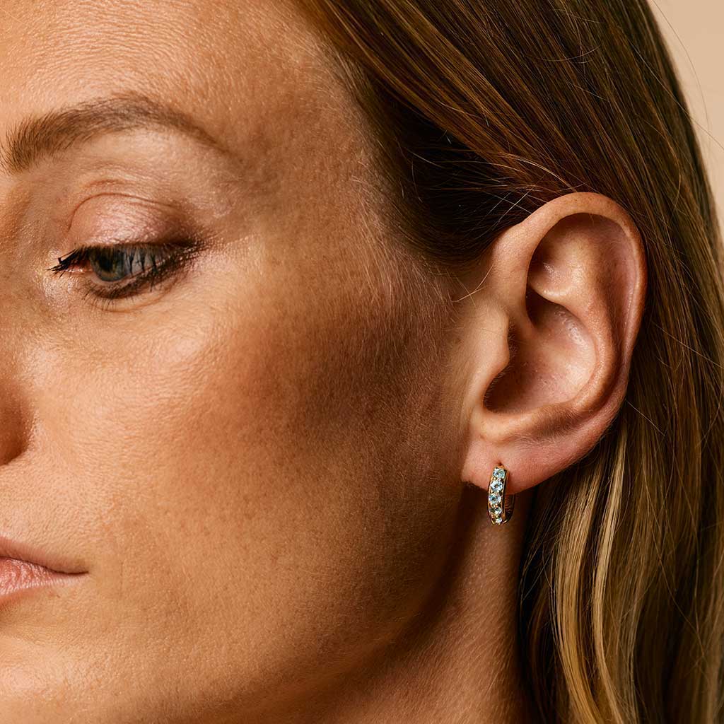 Gold and Blue Topaz Huggie Hoops