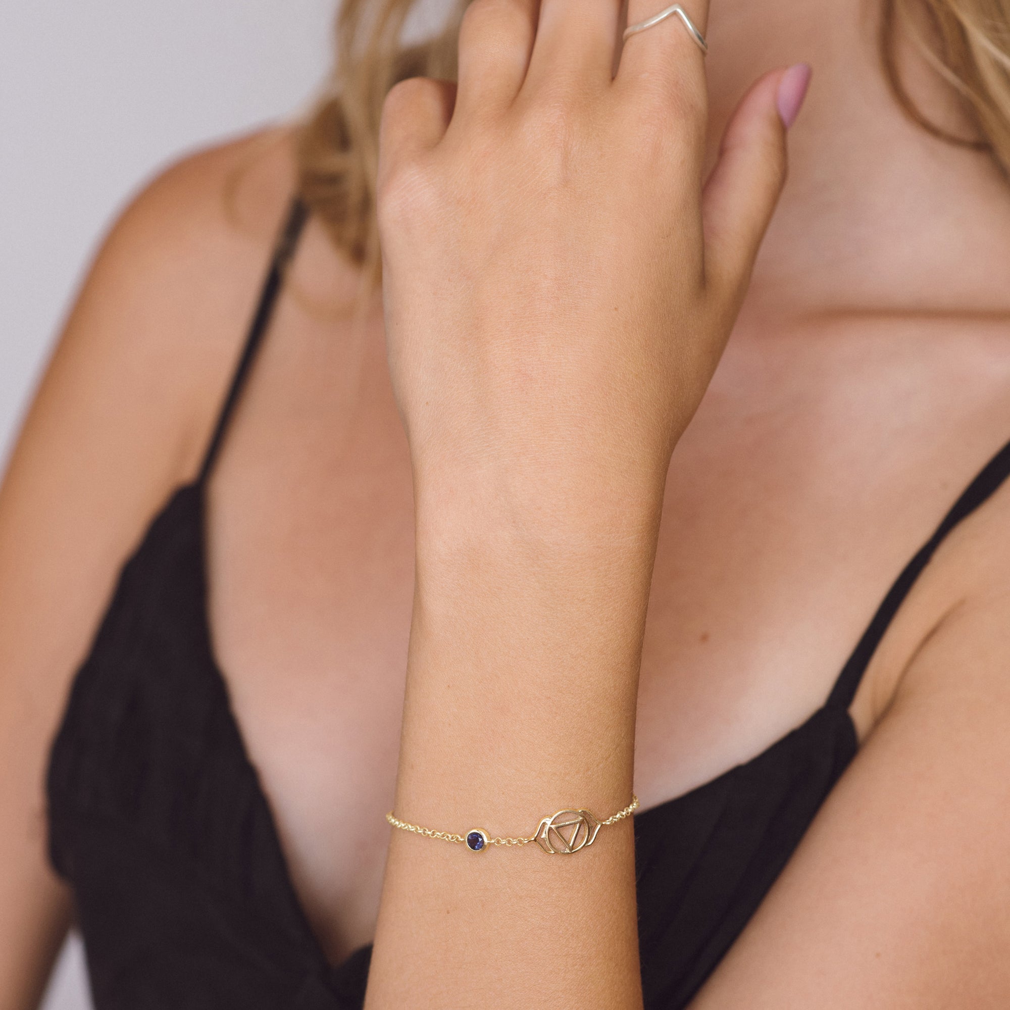 Gold Third Eye Chakra bracelet in sterling silver with lolite purple gemstone