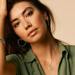 Gold hammered disc necklace