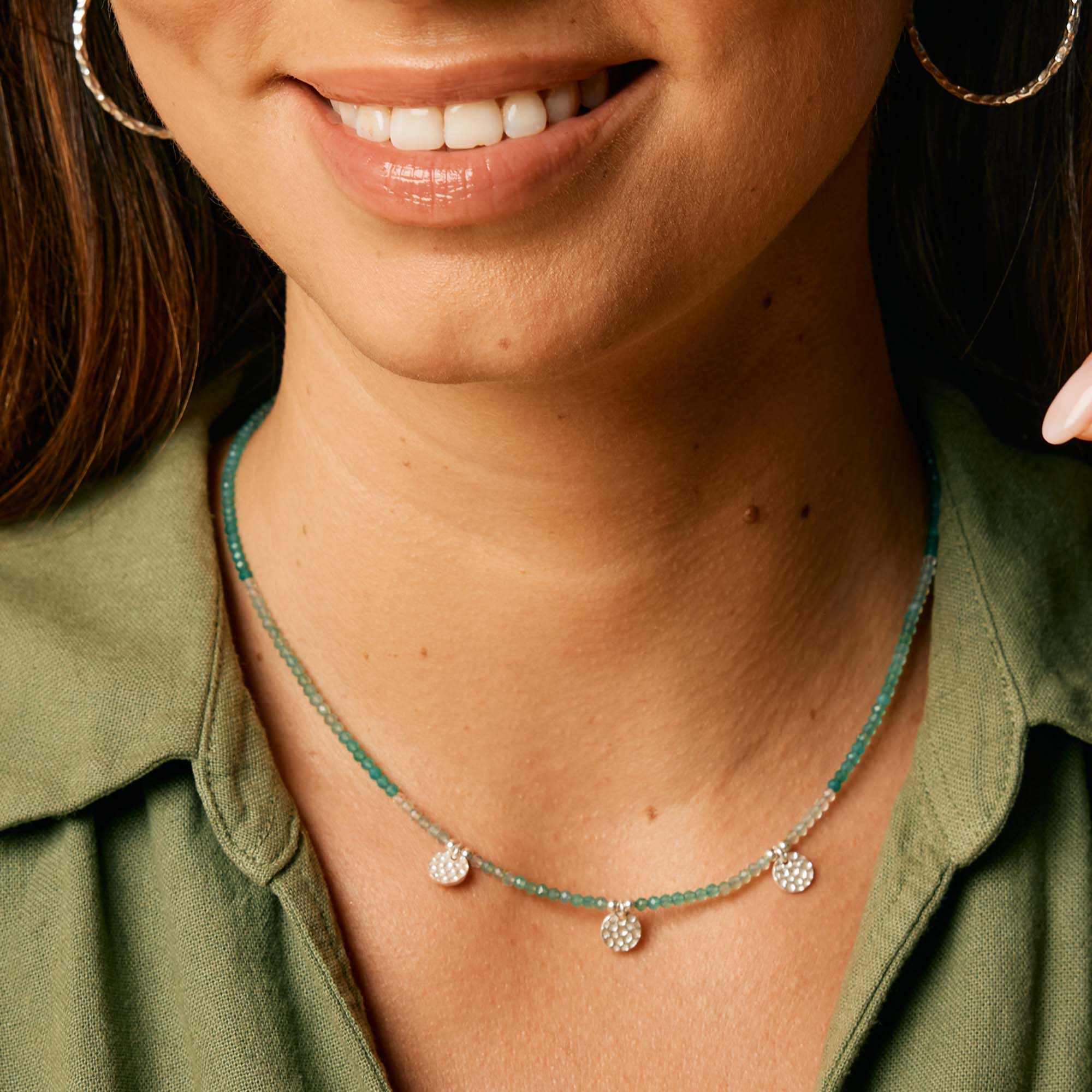 Green onyx beaded necklace with silver hammered discs 
