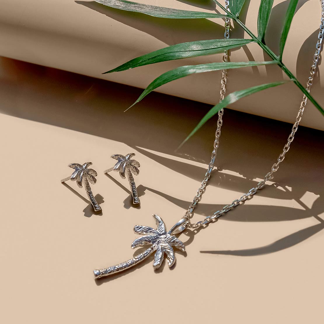 Silver Palm Tree Stud Earrings and necklace