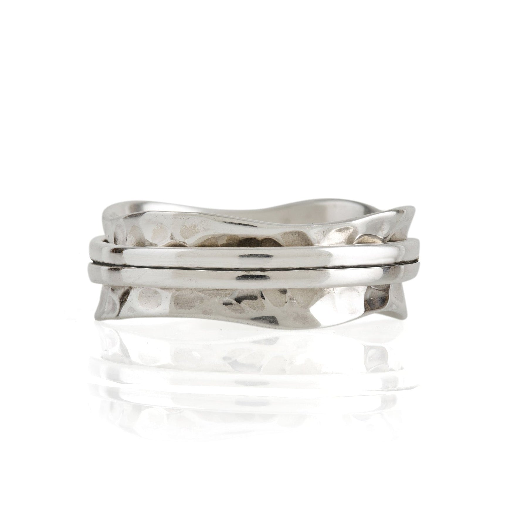 A silver spinning ring with two bands, featuring a matte finish and textured design. Hammered Silver Spinning Ring, Narrow Silver Spin ring
