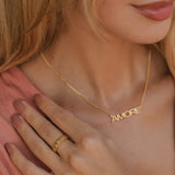 GOLD AMORE WORD SPINNING RING AND MATCHING NECKLACE