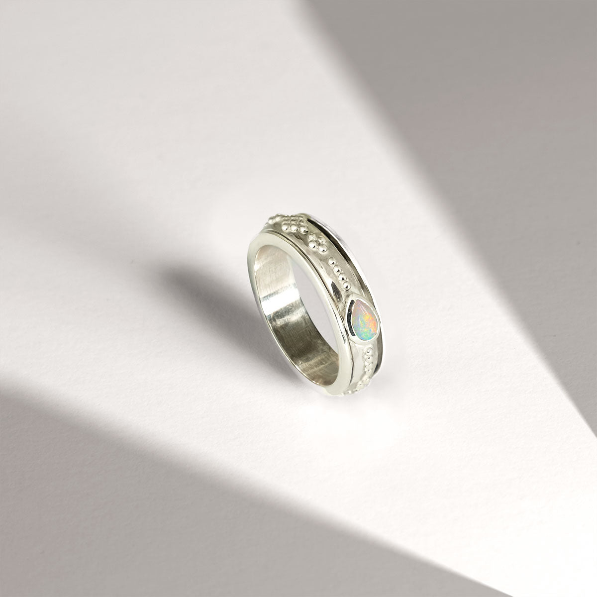 Sterling silver spinning ring with pear shaped opal gemstone, Sterling silver and opal spinning ring, Opal spinning ring, October birthstone ring