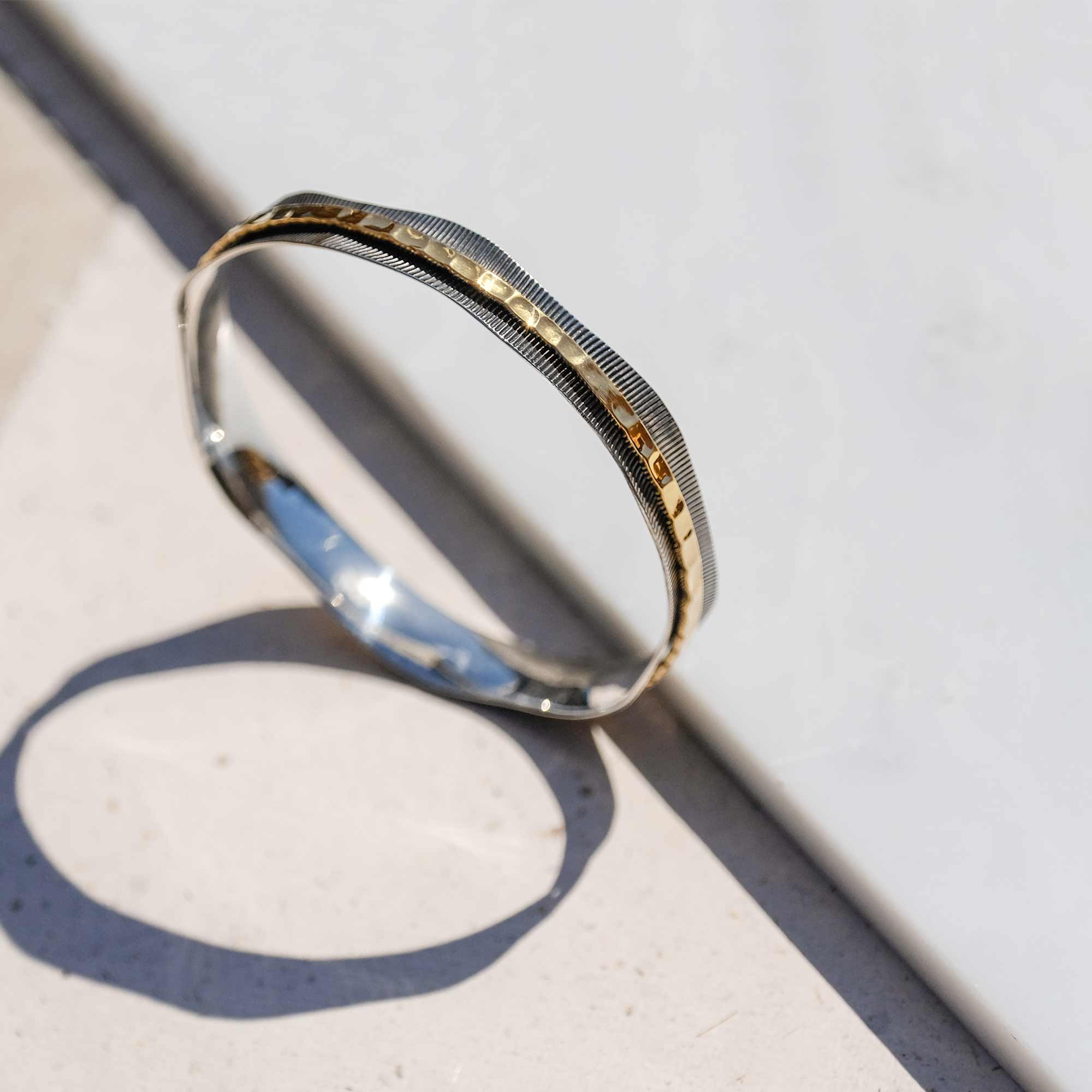 Silver and Brass Spinning Bangle