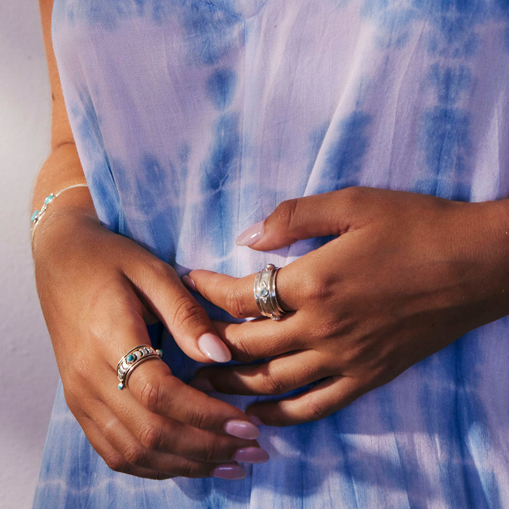 Trikona Blue Topaz Spinning Ring