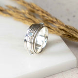 Blue topaz silver spinner ring